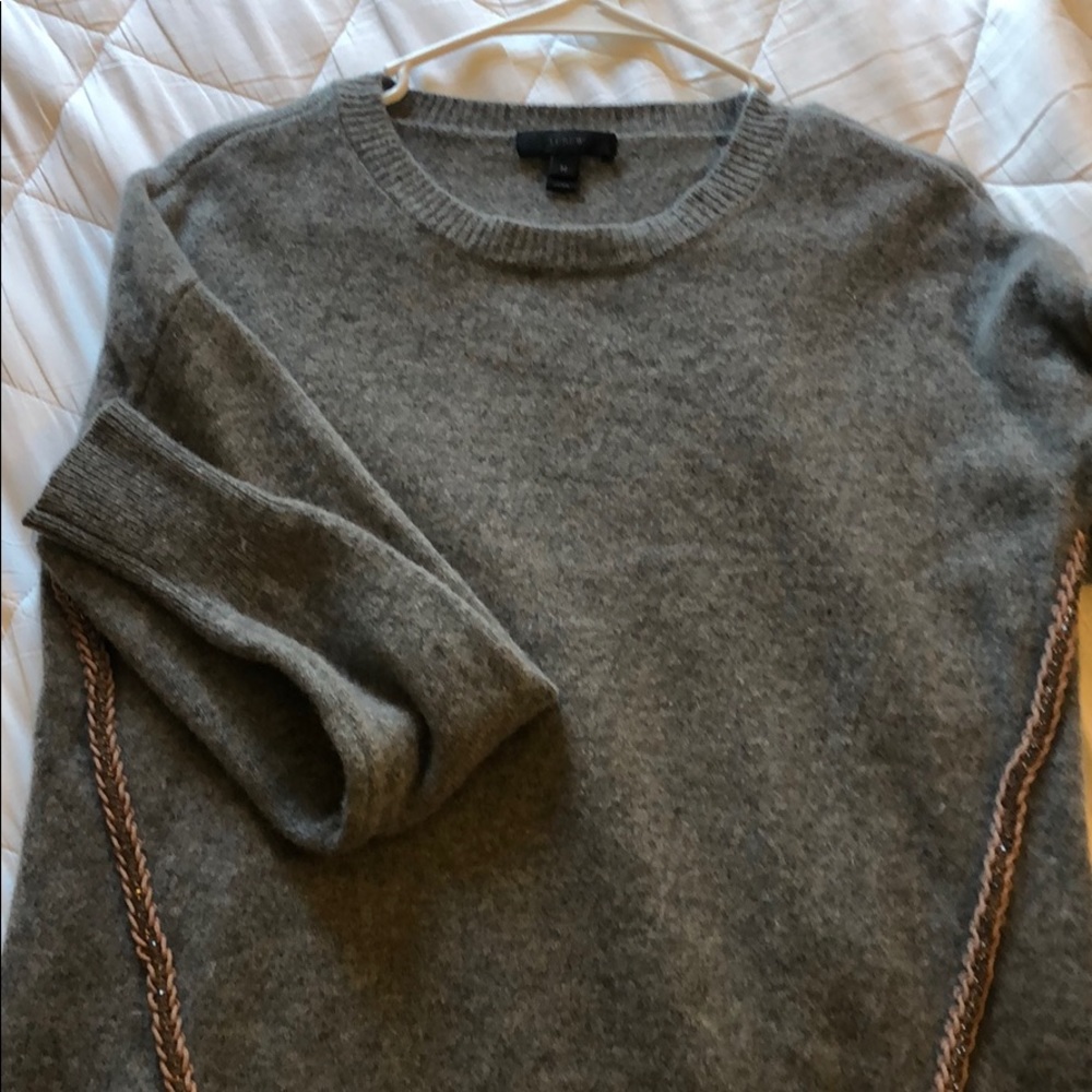 Soft Jcrew sweater with jeweled embellishment.